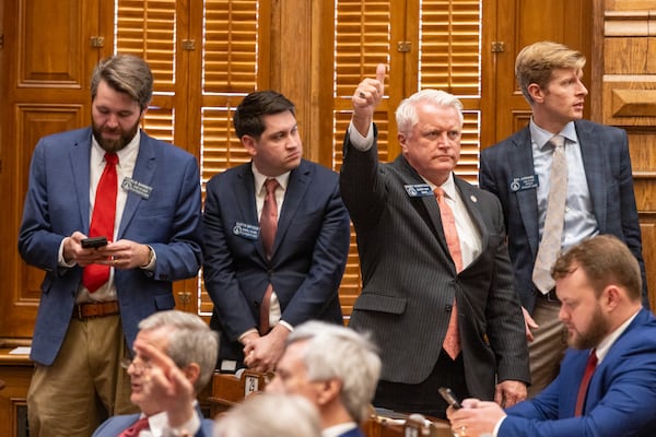 State Sen. Randy Robertson, R-Cataula, second from right, is the sponsor of a bill to ban THC-laden beverages in Georgia. That bill passed the Senate and awaits action in the House. (Arvin Temkar / AJC)