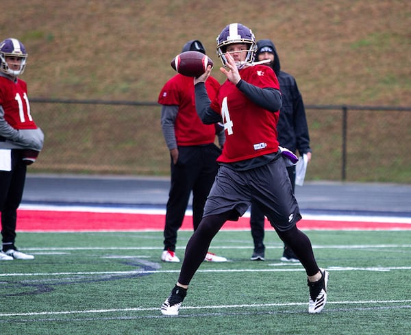 Quarterback Matt Simms rolls out for a pass during Atlanta Legends practice Feb. 22, 2019, at Milton High School in Milton