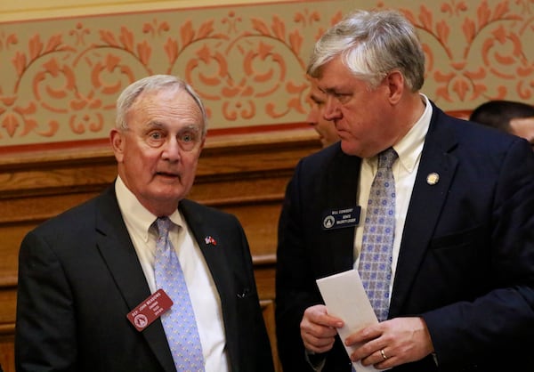 Mar. 24, 2016 - Atlanta - House Rules Chairman John Meadows (R - Calhoun) confers with Senate Majority Leader Bill Cowsert in the waning hours of the evening. Meadows bill to give minimum commissions to insurance agents failed to pass the senate. As this years general assembly came to a close on the 40th day of the legislative session, legislators considered scores of bills and went past the midnight deadline by about 30 minutes. BOB ANDRES / BANDRES@AJC.COM