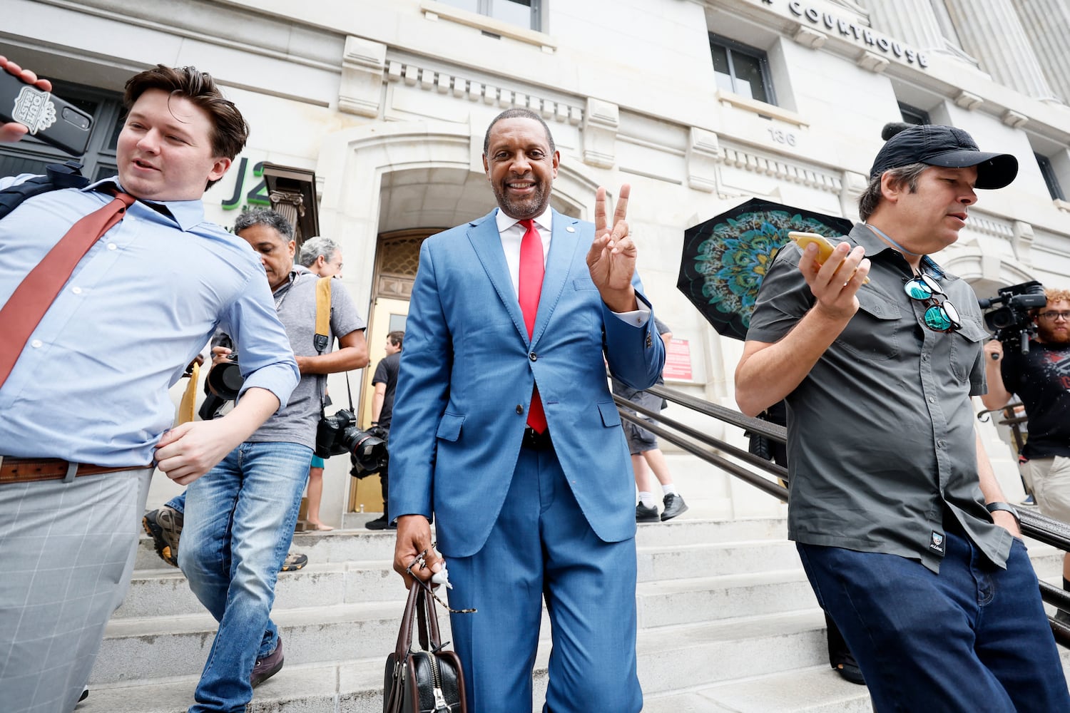 Former Georgia State Rep. Vernon Jones leaves the Fulton County Courthouse after accompanying Rudy Giuliani earlier to the Court on Wednesday, August 17, 2022. Giuliani appears before a special grand jury to testify about his involvement in Donald Trump's attempt to overturn the 2020 election in Georgia. Miguel Martinez / miguel.martinezjimenez@ajc.com