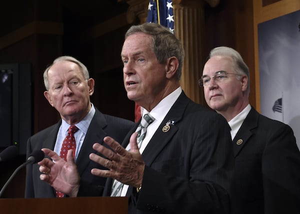 In this July 27, 2015, file photo, Rep. Joe Wilson (center), R-S.C., speaks during a news conference on Capitol Hill in Washington. The South Carolina representative who shouted “You lie!” at President Barack Obama during a joint session of Congress later was on the receiving end of the same words in his district. Wilson heard plenty of boos and chants of “You lie!” during a town hall April 10, 2017, in Graniteville, S.C. 