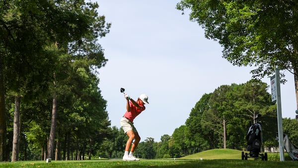 Carter Loflin hits his tee shot on the 10th hole during the semifinals at the 2022 U.S. Amateur Four-Ball at Country Club of Birmingham (West and East Courses) in Birmingham, Ala., on May 18. (James Gilbert/USGA)