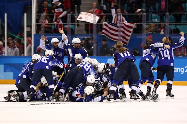 GANGNEUNG, SOUTH KOREA - FEBRUARY 22:  The United States celebrates after defeating Canada in a shootout to win the Women's Gold Medal Game on day thirteen of the PyeongChang 2018 Winter Olympic Games at Gangneung Hockey Centre on February 22, 2018 in Gangneung, South Korea.  (Photo by Jamie Squire/Getty Images)