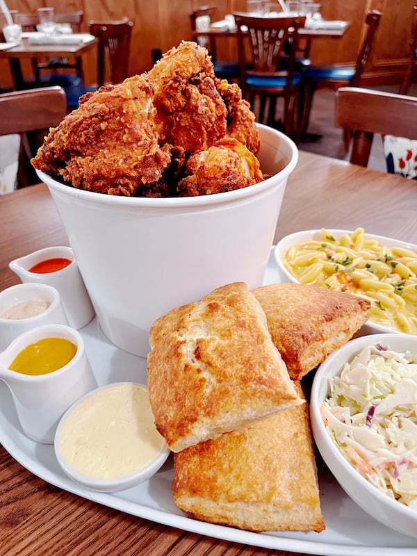 Roshambo's bucket of fried chicken comes with mac and cheese, coleslaw, biscuits and dipping sauce. Courtesy of Layla Ritchie