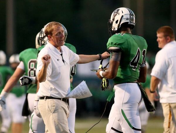 November 4, 2016 - Roswell, Ga: Roswell coach John Ford gets the team psyched up before their game against Cherokee at Roswell High School Friday November 4, 2016, in Roswell, Ga. The winner is the Region 4-AAAAAAA champion. PHOTO / JASON GETZ