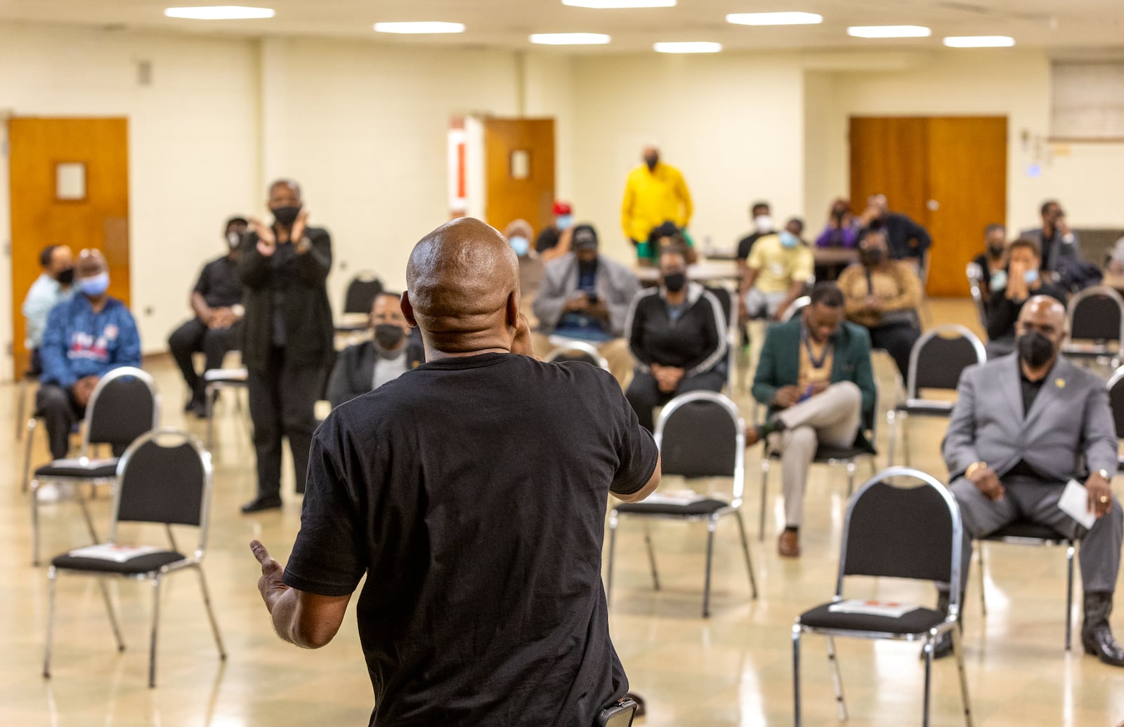 Kenneth Miller, a Fulton County high school athletic director, speaks at a rally for him at East Point First Mallalieu United Methodist Church on March 17, 2022. Miller is appealing a suspension after he was accused of pushing a student during a campus search for a handgun. He has been on paid leave from his post at Tri-Cities High School since shortly after the August incident.  (Jenni Girtman for The Atlanta Journal-Constitution)