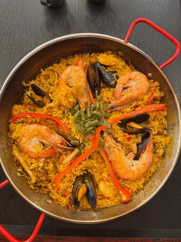 Find paella at Arepa Grill Kitchen & Wine, a  Venezuelan and Spanish restaurant in Roswell.