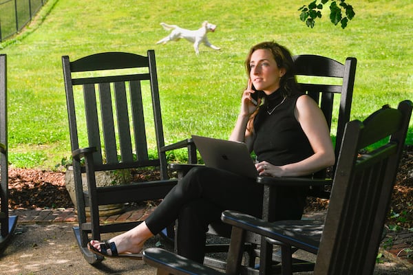 Emily Weddington is pictured at her home in Brentwood, Tenn., a suburban city outside of Nashville, on Friday April 30, 2021. She and her husband decided to move from Atlanta to be closer to family and have a larger yard for their dogs. Because of relaxed work-from-home policies during the pandemic, some workforces now are able to live much farther from where their jobs are based. JOHN AMIS FOR THE ATLANTA JOURNAL-CONSTITUTION