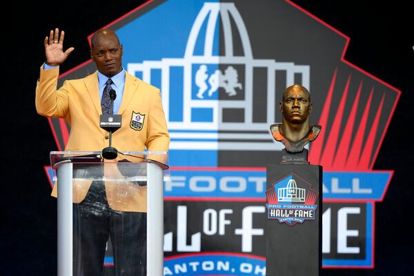 Former NFL player Bryant Young speaks during his induction into the Pro Football Hall of Fame, Saturday, Aug. 6, 2022, in Canton, Ohio. (AP Photo/David Richard)