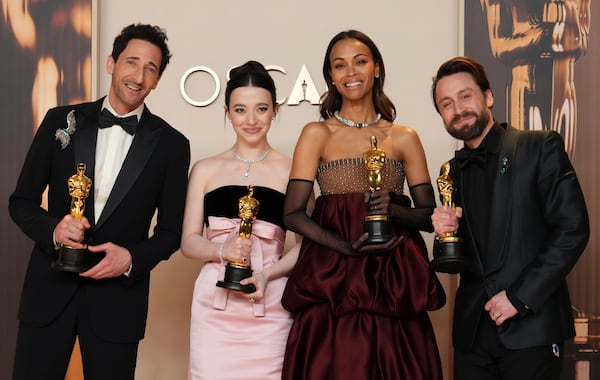 Adrien Brody, from left, winner of the award for best performance by an actor in a leading role for "The Brutalist," Mikey Madison, winner of the award for best performance by an actress in a leading role for "Anora," Zoe Saldana, winner of the award for best performance by an actress in a supporting role for "Emilia Perez," and Kieran Culkin, winner of the award for best performance by an actor in a supporting role for "A Real Pain," pose in the press room at the Oscars on Sunday, March 2, 2025, at the Dolby Theatre in Los Angeles. (Photo by Jordan Strauss/Invision/AP)