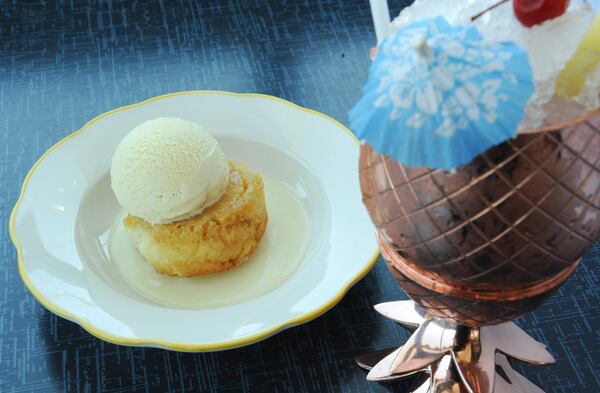 Pineapple Upside-Down Cake with hot buttered rum and star anise ice cream; Bay Breeze for Two with Absolut Elyx - bruleed fresh pineapple, cranberry juice, crushed ice, served in a copper pineapple. (Beckystein.com)