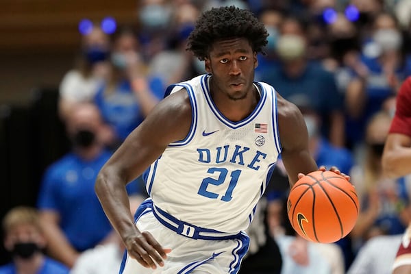 Duke forward A.J. Griffin (21) dribbles against Elon during the first half of an NCAA college basketball game in Durham, N.C., Saturday, Dec. 18, 2021. (AP Photo/Gerry Broome)