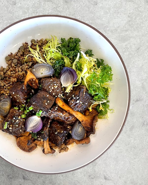 The brisket bourguignon from Danbi Seasonal Kitchen features pearl onions and French vinaigrette.