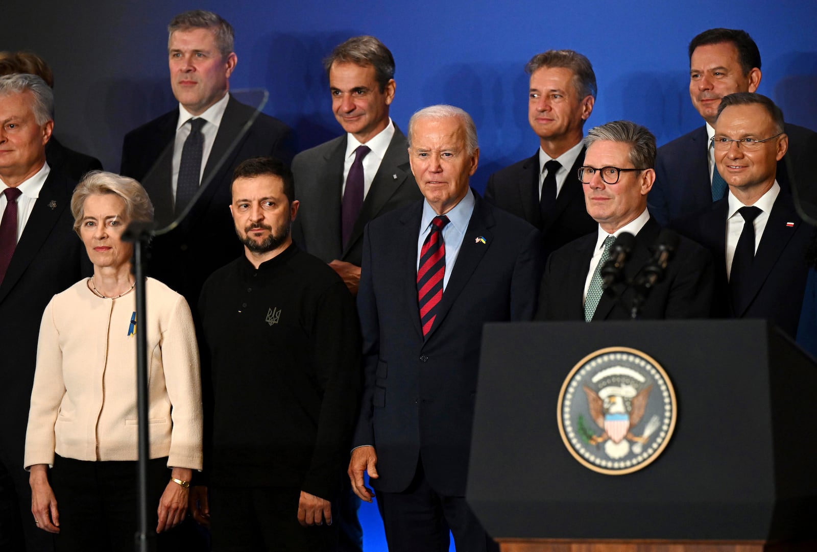 FILE - U.S. President Joe Biden, center, with Ukraine's President Volodymyr Zelenskyy, front second left, European Commission President Ursula von der Leyen, front left, Britain's Prime Minister Keir Starmer, front second right, Poland’s President Andrzej Duda, right, and other world leaders pose at the launch of the Joint Declaration of Support for Ukrainian Recovery and Reconstruction, on Sept. 25, 2024, in New York. (Leon Neal/Pool Photo via AP, File)