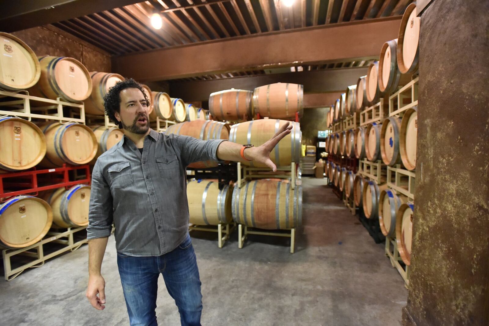 Eric Miller shows one of the wine caves at Yonah Mountain Vineyards in Cleveland, Ga. Solar energy is expected to provide about 60% of the total energy used annually for operations at Yonah. HYOSUB SHIN / HSHIN@AJC.COM