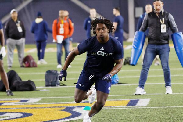 Linebacker Charlie Thomas runs a drill during Georgia Tech's Pro Day at the Mary and John Brock Football Practice Facility on Thursday. (Miguel Martinez /miguel.martinezjimenez@ajc.com)