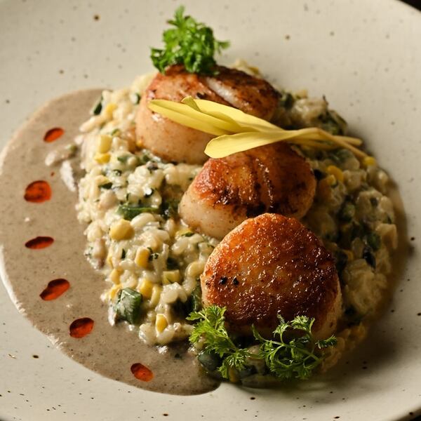 Pata Negra's temporada de lluvias features scallops over a huitlacoche risotto. Courtesy of Pata Negra