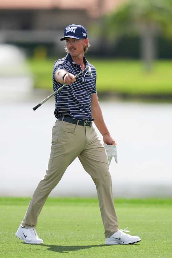 Jake Knapp walks on the 18th hole during the first round of the Cognizant Classic golf tournament, Thursday, Feb. 27, 2025, in Palm Beach Gardens, Fla. (AP Photo/Rebecca Blackwell)