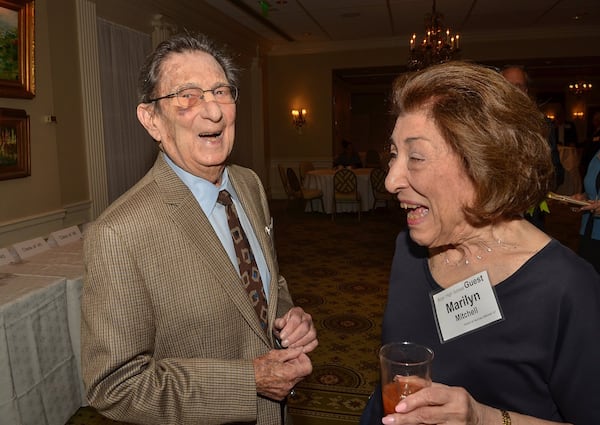 Herman Mitchell (owner of one of Atlanta’s most iconic chains of stores, Happy Herman’s) laughs with his wife, Marilyn Mitchell, while telling tales from back in the day. CONTRIBUTED BY CHRIS HUNT