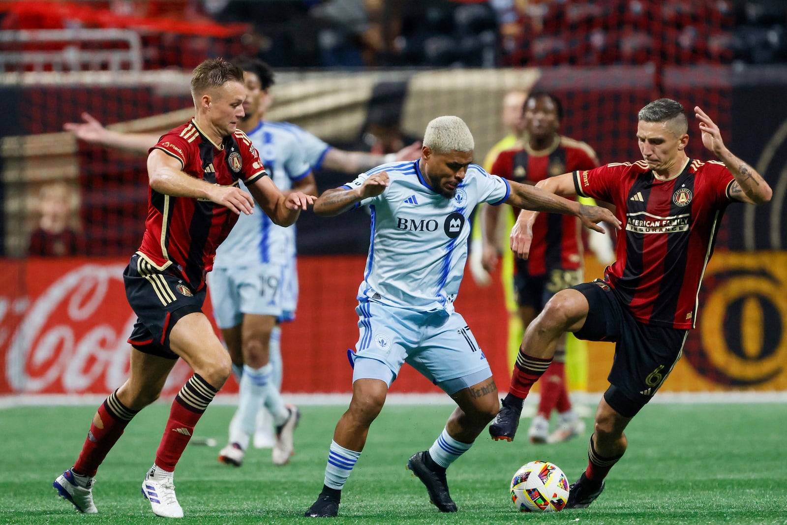 Montreal forward Josef Martinez (center) battles Atlanta United players during an Oct. 2 matchup.