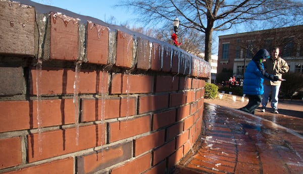 Dec. 22, 2012: As the wind howled Friday night over Marietta Square, visitors awoke Saturday morning, Dec. 22, to a layer of ice and icicles near the fountain.