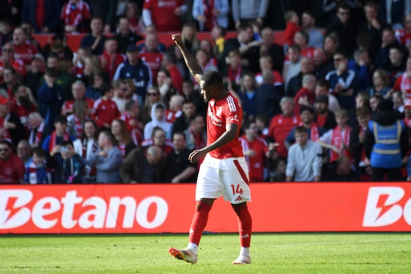 Nottingham Forest's Callum Hudson-Odoi celebrates scoring his side's opening goal during the English Premier League soccer match between Nottingham Forest and Manchester City at the City Ground stadium, in Nottingham, England, Saturday, March 8, 2025. (AP Photo/Rui Vieira)