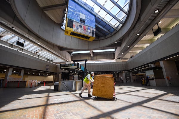 A construction worker works on the renovation in Five Point Station in Atlanta, Georgia on  Tuesday, June 25, 2024.  (Ziyu Julian Zhu / AJC)