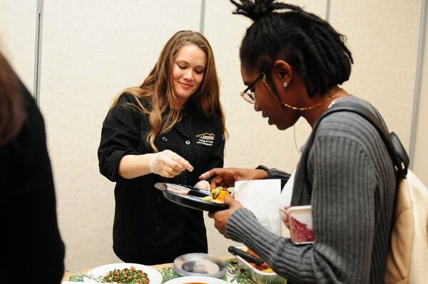 At the finale of Kennesaw State University’s Culinary Apprenticeship Certificate Program, Stephanie Skolnick serves her take on Brazilian street food. CONTRIBUTED BY TODD HULL