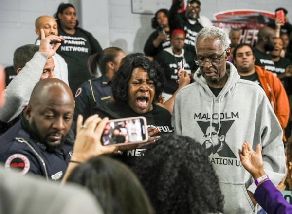 School choice activists interrupt Elizabeth Warren’s campaign rally at Clark Atlanta University on Thursday, Nov. 21, 2019. (Alyssa Pointer/The Atlanta Journal-Constitution) 