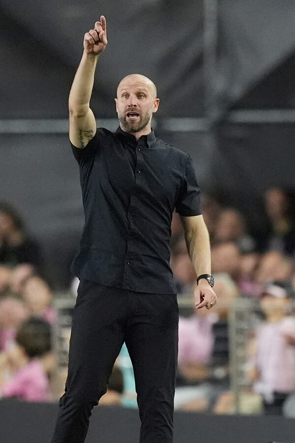 Atlanta United head coach Rob Valentino gestures during the first half of an MLS playoff opening round soccer match against Inter Miami, Saturday, Nov. 9, 2024, in Fort Lauderdale, Fla. (AP Photo/Rebecca Blackwell)