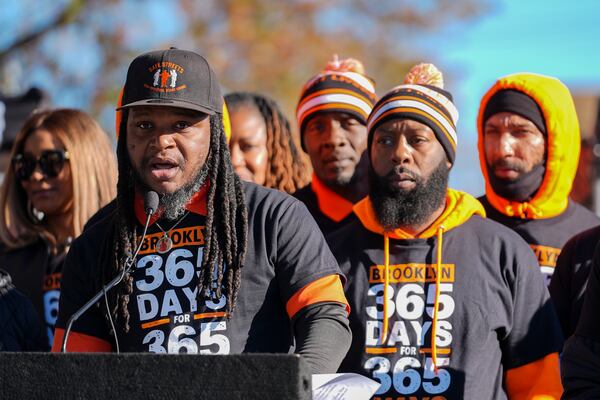 Sean Wees, director of Safe Streets' Brooklyn site, speaks during a press conference to celebrate achieving over 365 days without a homicide within the Brooklyn neighborhood Safe Streets catchment zone, Tuesday, Nov. 12, 2024, in Baltimore. (AP Photo/Stephanie Scarbrough)