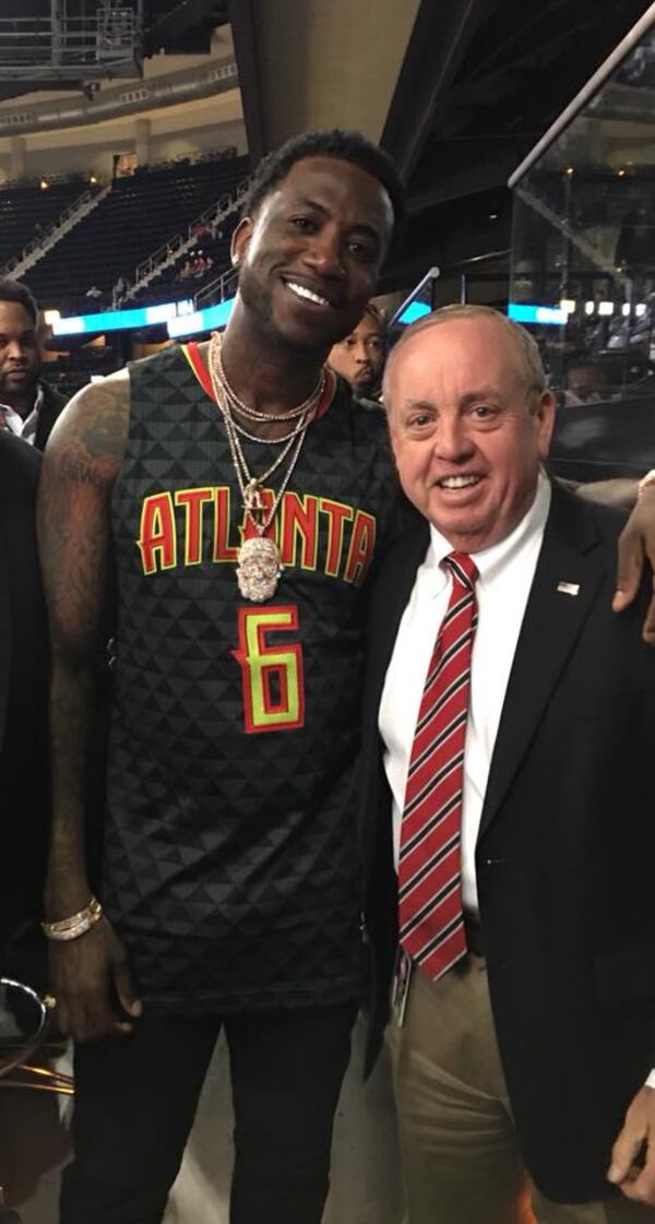  Steve Holman Sr. with Gucci Mane.