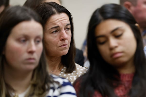 Allyson Phillips, mother of Laken Riley, second left, listens during the trial of Jose Ibarra at Athens-Clarke County Superior Court on Monday, Nov. 18, 2024, in Athens, Ga. (Miguel Martinez/Atlanta Journal-Constitution via AP)