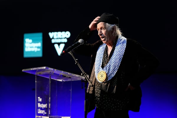 Musician Keith Richards speaks after receiving the first Connecticut Governor's Award of Excellence in Westport, Conn., Wednesday, March 5, 2025. (AP Photo/Seth Wenig)