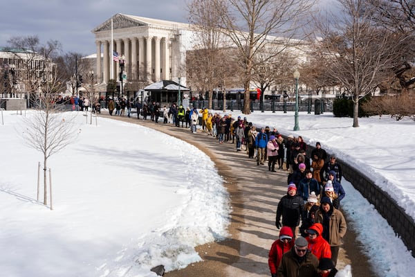 People in line outside the Capitol for the public viewing of former President Jimmy Carter as Carter lies in state in the Rotunda of the Capitol in Washington, on Wednesday, Jan. 8, 2025. (Eric Lee/The New York Times)
                      