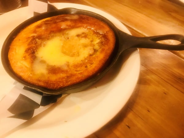 Don’t miss the butter pecan cornbread at Soul Crab. While offered as a starter, it is sweet enough to suffice for dessert. LIGAYA FIGUERAS / LFIGUERAS@AJC.COM