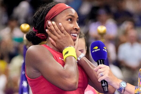 Coco Gauff, of the United States, reacts during an interview after defeating Aryna Sabalenka, of Belarus, in the women's singles final of the U.S. Open tennis championships, Saturday, Sept. 9, 2023, in New York. (AP Photo/Frank Franklin II)