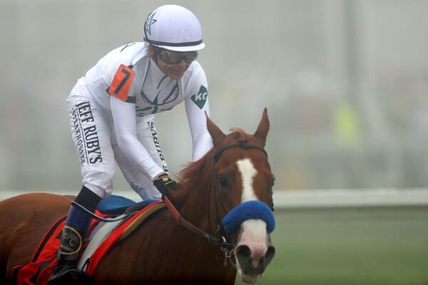 BALTIMORE, MD - MAY 19: Justify #7 ridden by jockey Mike Smith wins the 143rd running of the Preakness Stakes at Pimlico Race Course on May 19, 2018 in Baltimore, Maryland. (Photo by Patrick Smith/Getty Images)