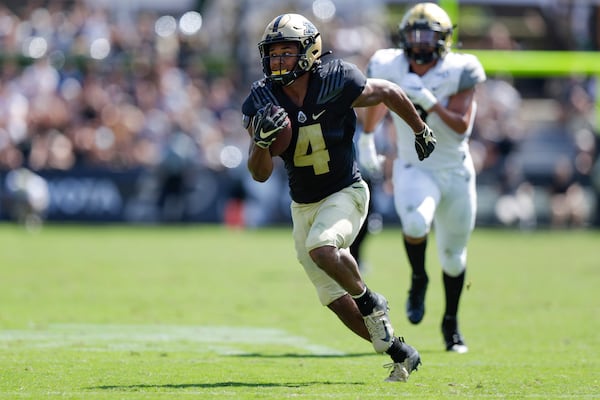 Purdue wide receiver Rondale Moore (4) runs after a catch against Vanderbilt during the second half Saturday, Sept. 7, 2019, in West Lafayette, Ind. Purdue defeated Vanderbilt 42-24. (Michael Conroy/AP)