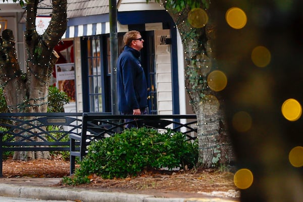 A person walking on Carroll Street in downtown in Perry on Thursday, February 13, 2025. The variety of businesses and shops is notable, reflecting the ongoing revival of this historic downtown area.
(Miguel Martinez/ AJC)