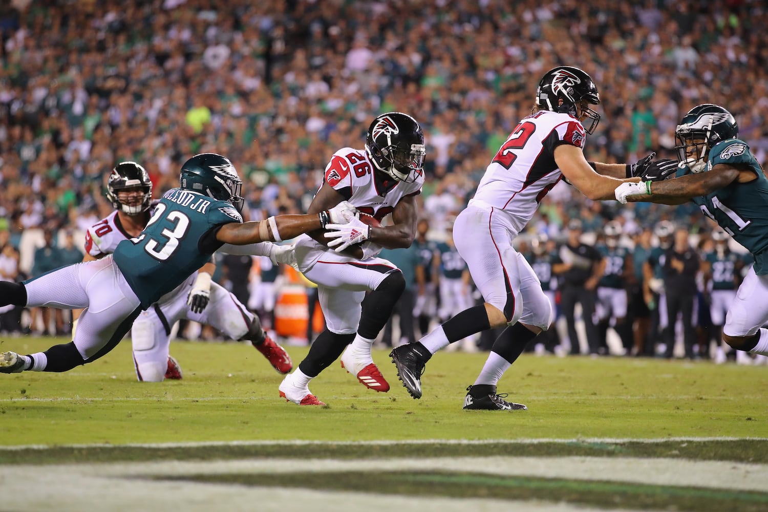 Photos: Falcons fall to Eagles in season opener