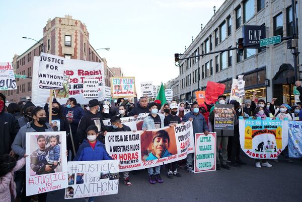 Activists gather at a demonstration for Adam Toledo, a seventh grader from Little Village, a neighborhood on Chicago’s West Side. Adam was one of the youngest people killed by the police in Illinois in years. Chicagoans reacted with grief. Some recalled Laquan McDonald, another teen killed by the police.