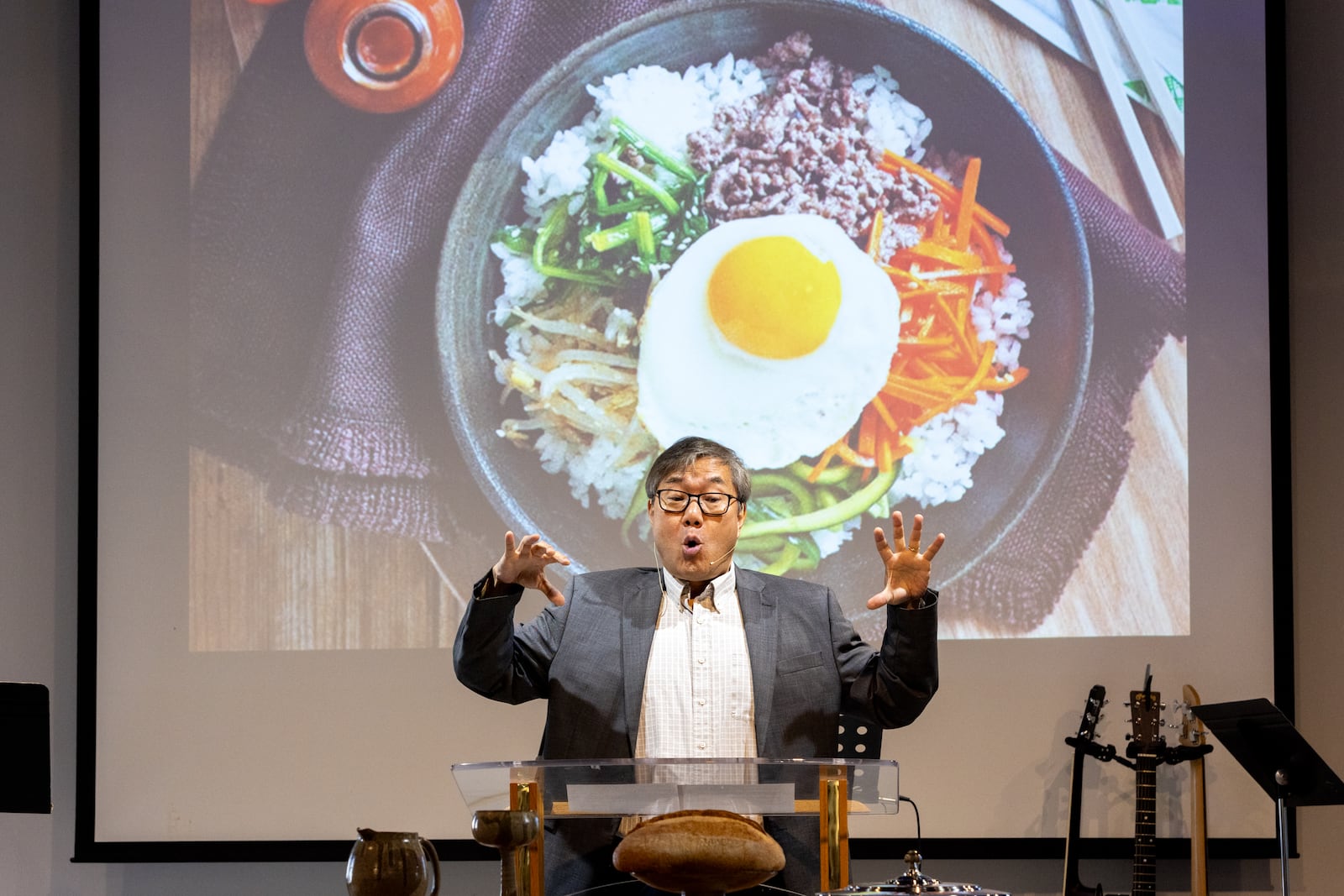 Korean Central Presbyterian Church of Atlanta head pastor the Rev. Byeong Han said while Asian Americans may not have historically been incredibly active politically, things changed after the 2021 Atlanta spa shootings that claimed eight lives, many of them women of Asian descent. "Our growing voting power has made it clear that our voices matter, and political campaigns are taking notice," Han said. "I think this attention is overdue, but it’s encouraging to see that Asian American voters are being recognized as a key constituency. However, it’s important for this engagement to be ongoing and not just focused on election cycles." Pastor Kevin Park (pictured above) delivers a sermon at Korean Central Presbyterian Church of Atlanta on Sunday, Oct. 6, 2024.