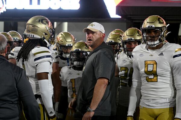 Georgia Tech head coach Brent Key fires up before an NCAA football game against Georgia Tech at Sanford Stadium, Friday, November 29, 2024, in Athens. Georgia won 44-42 in eight overtimes. (Hyosub Shin / AJC)