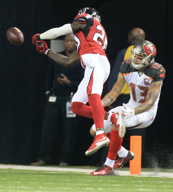 110115 ATLANTA: -- Falcons cornerback Phillip Adams is called for pass interferance against Buccaneers wide receiver Mike Evans setting up the winning Buccaneers field goal in overtime in a football game on Sunday, Nov. 1, 2015, in Atlanta. The Falcons were defeated 23-20 by the Buccaneers in over time. Curtis Compton / ccompton@ajc.com