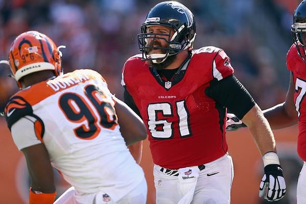 Falcons center Joe Hawley (61), who earned the starting spot midway through the 2013 season, was out for the rest of the year after sustaining a season-ending torn right ACL in his knee in the loss to the Vikings on Sept. 28. (Andy Lyons / Getty Images)