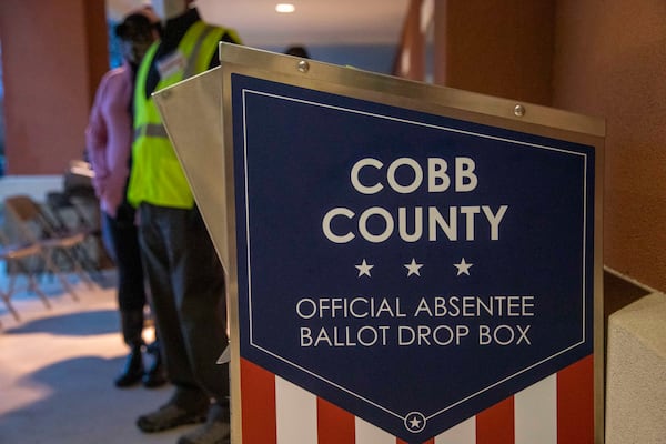 Absentee voters usage of drop boxes in Cobb, DeKalb and Fulton counties saw a steep drop during the 2021 elections after limits under a new state voting law took effect.  (Alyssa Pointer / Alyssa.Pointer@ajc.com)