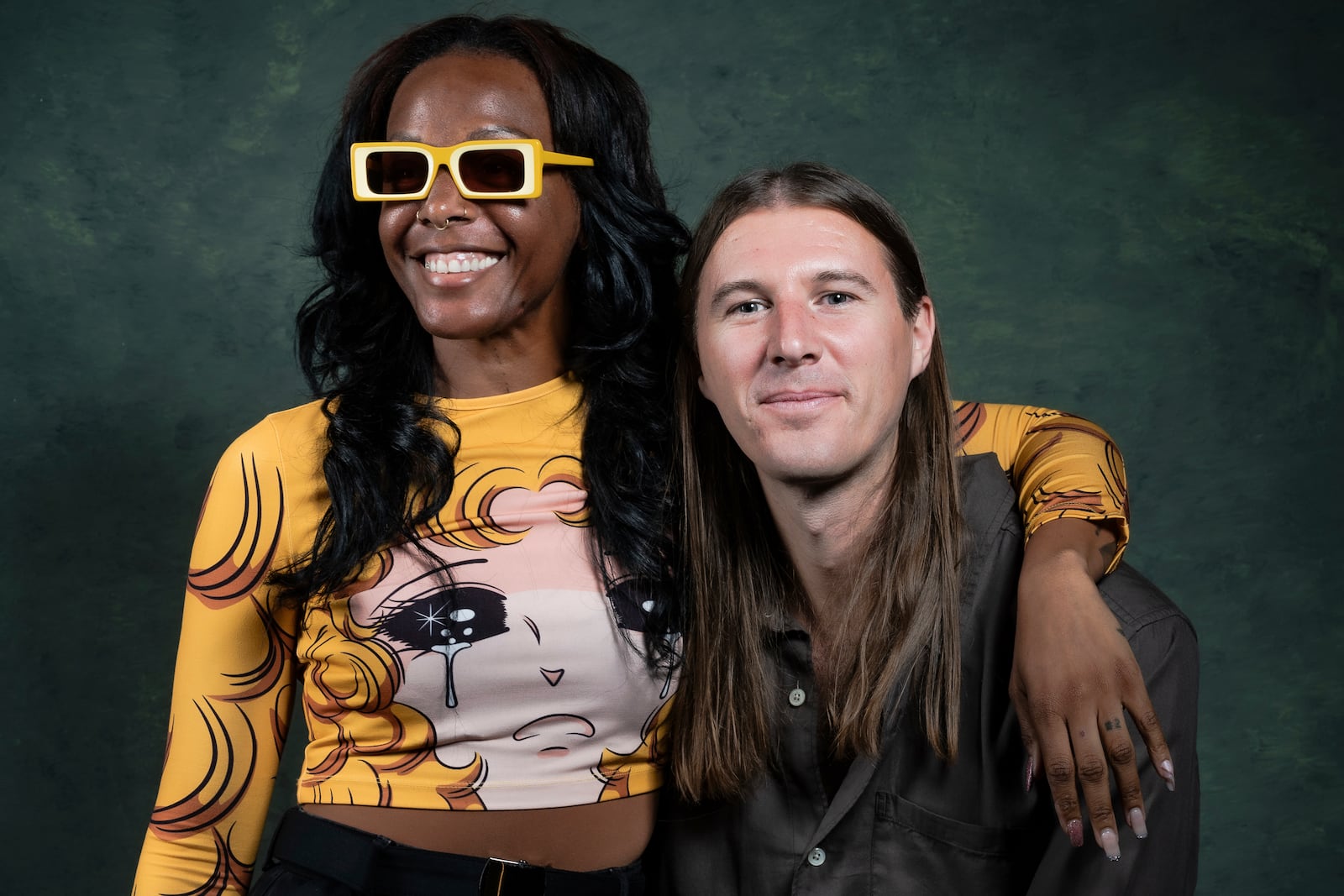 Dawn Richard, left, and Spencer Zahn pose for a portrait to promote the album "Quiet in a World Full of Noise" in Los Angeles on Thursday, Oct. 10, 2024. (AP Photo/Damian Dovarganes)