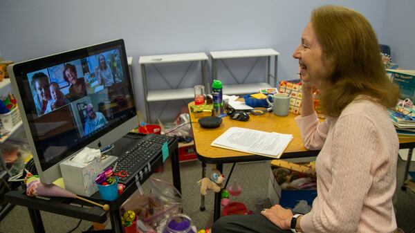 Alison Tucker interacts with a family during a teletherapy session the Auditory-Verbal Center in Atlanta. PHIL SKINNER FOR THE ATLANTA JOURNAL-CONSTITUTION.