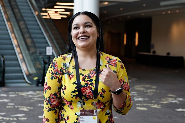 Artia Strickland attends Gwinnett County Public Schools’ annual new teacher orientation at Gas South Convention Center on Tuesday, July 12, 2022. She will be teaching kindergarten at Anderson-Livesy Elementary School.  (Natrice Miller/natrice.miller@ajc.com)